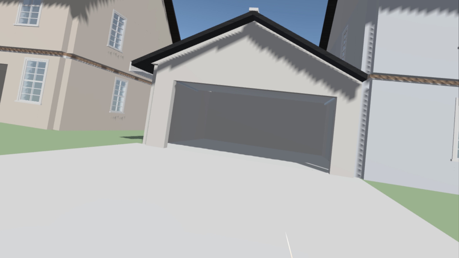 Standing on a driveway looking into an open two-car garage